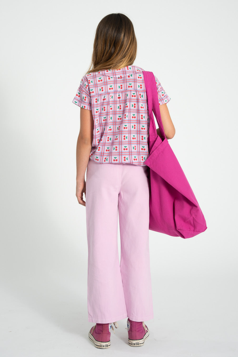 Bolsa xl fucsia con estampado peace conjunto trasera