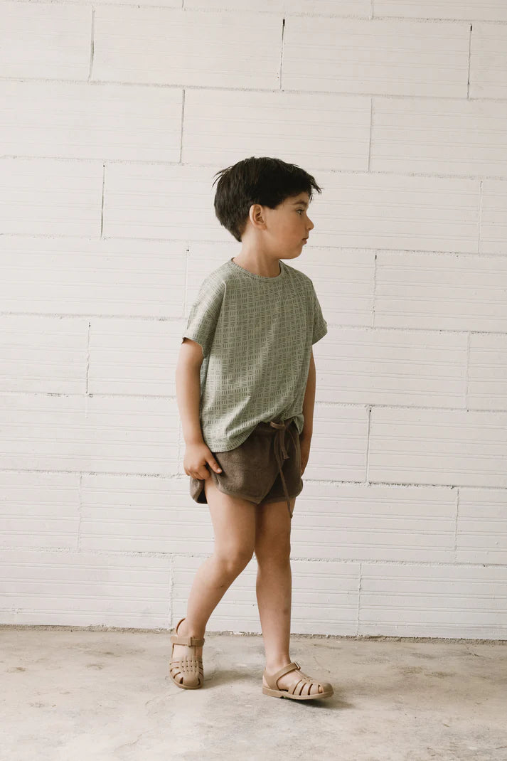 Camiseta oversized haco verde mimbre exterior