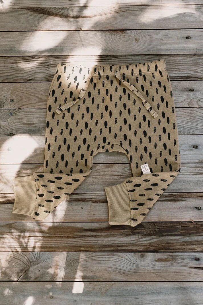 Pantalon bebe joali piedras beige delantera