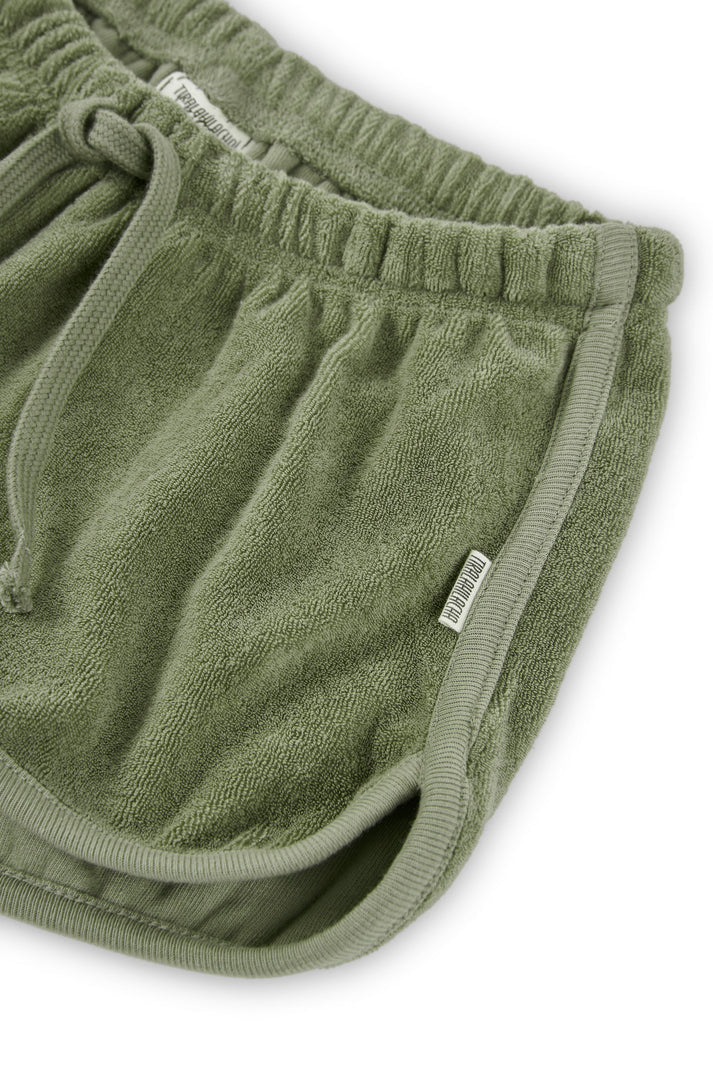Pantalon corto huali rizo algodon organico verde jade detalle