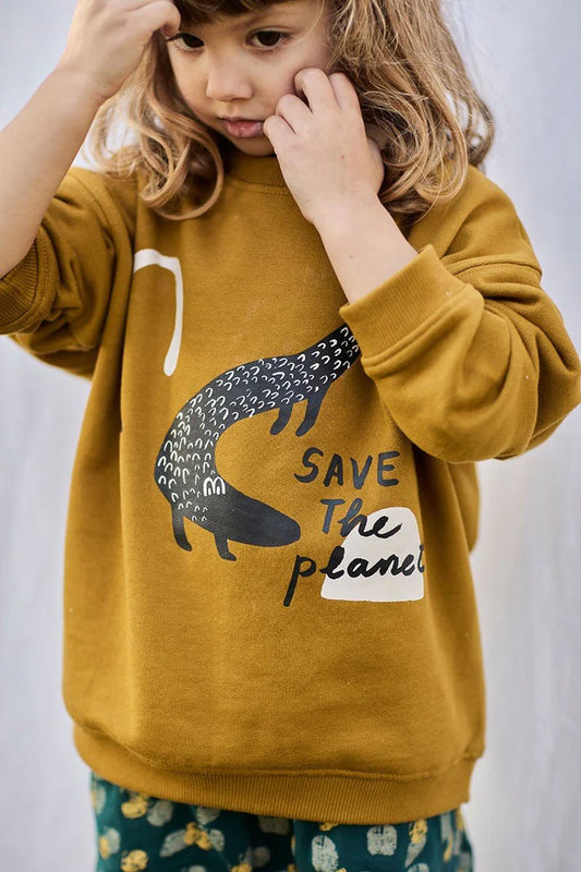 Sudadera unisex cocodrilo mostaza de algodon organico exterior