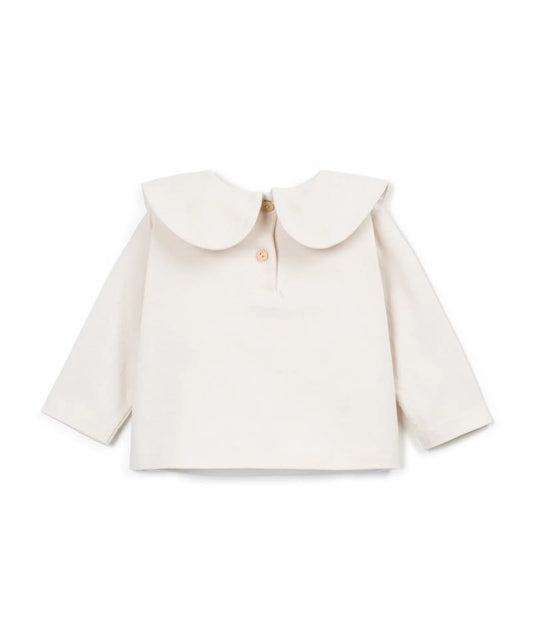 Camiseta Bebé Algodón Cruda Cuello Amplio de Play Up - vista trasera.