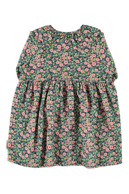 Detalle de vestido de niña verde con flores multicolor de piupiuchick.