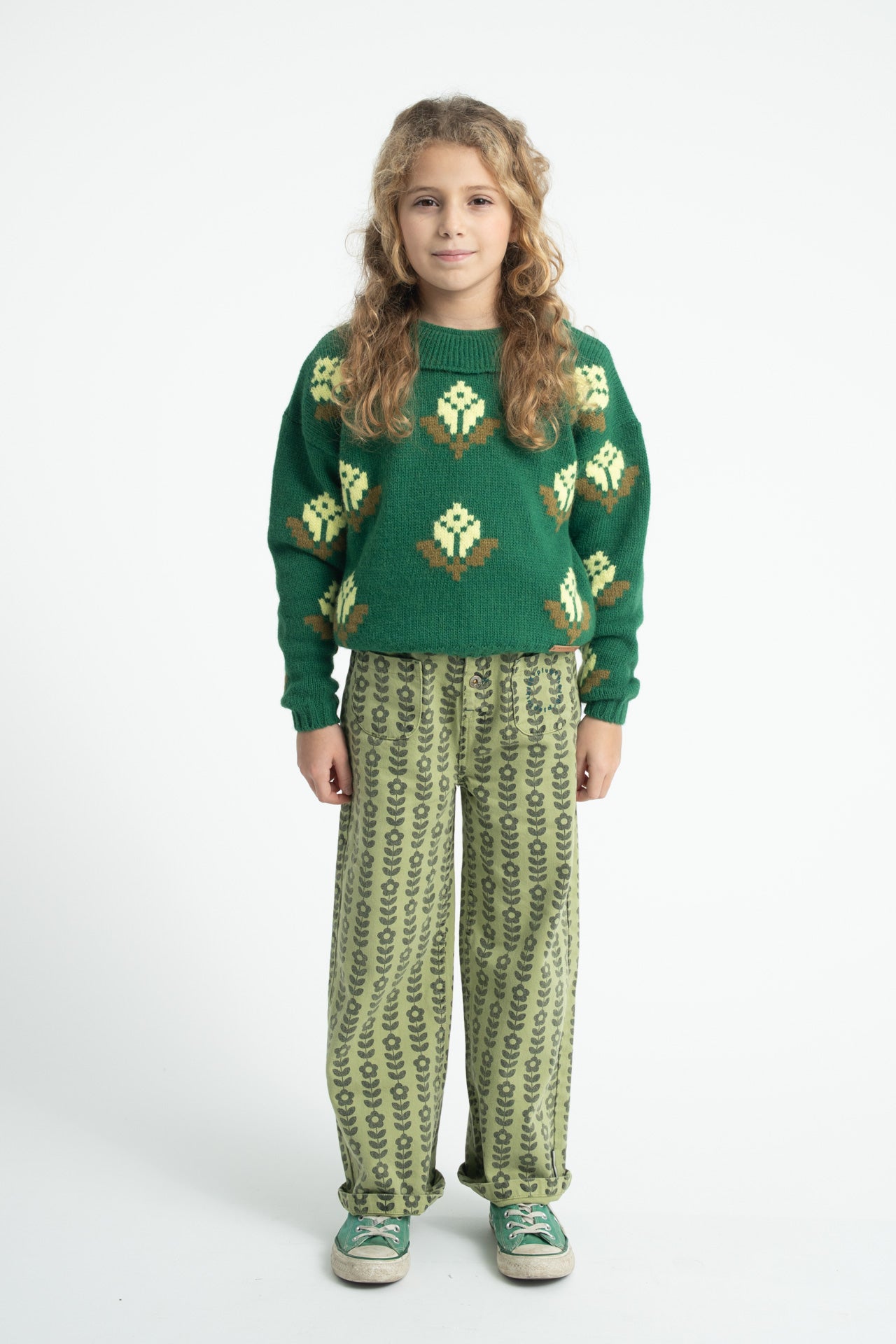 Parte trasera de jersey de niña verde con flores de piupiuchick.