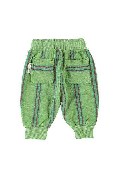 Detalle de pantalón jogger de bebé verde con rayas dobles de piupiuchick.
