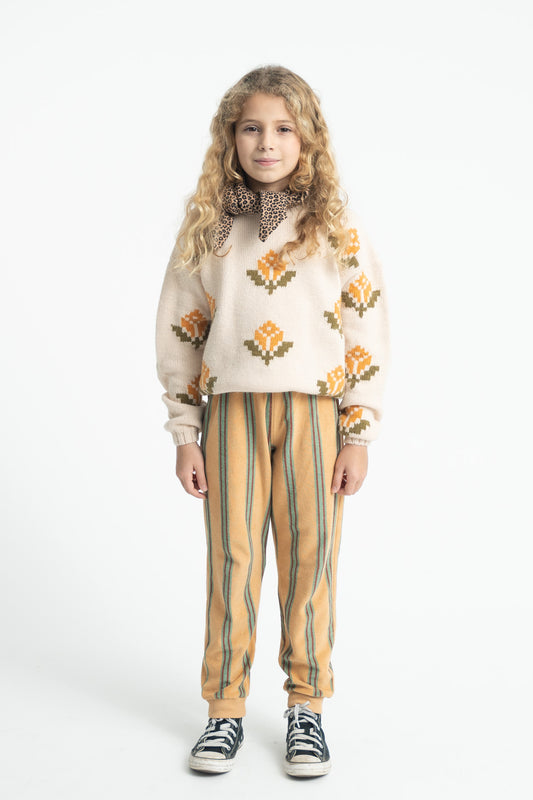Parte trasera de pantalón jogger de niño arena con rayas dobles de piupiuchick.