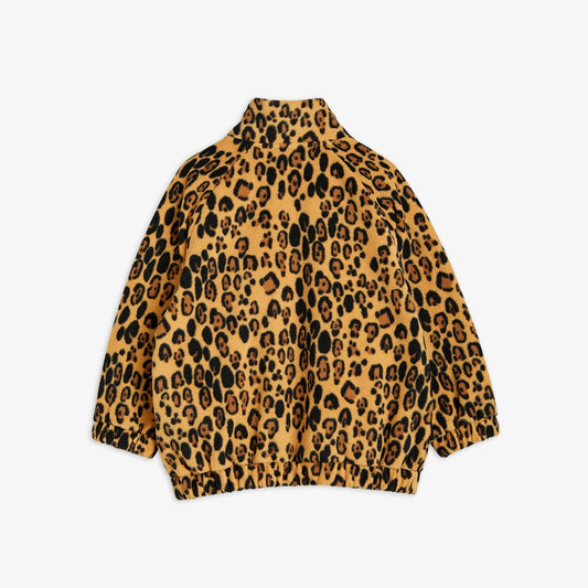 Parte trasera de la chaqueta de niño beige leopardo.