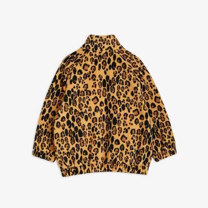 Parte trasera de la chaqueta de niño beige leopardo.