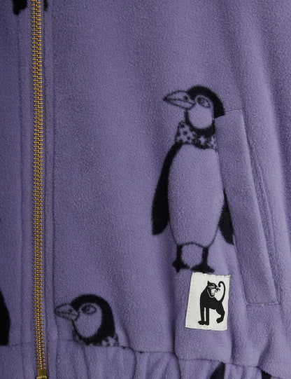 Detalle del diseño pingüinos en color púrpura.