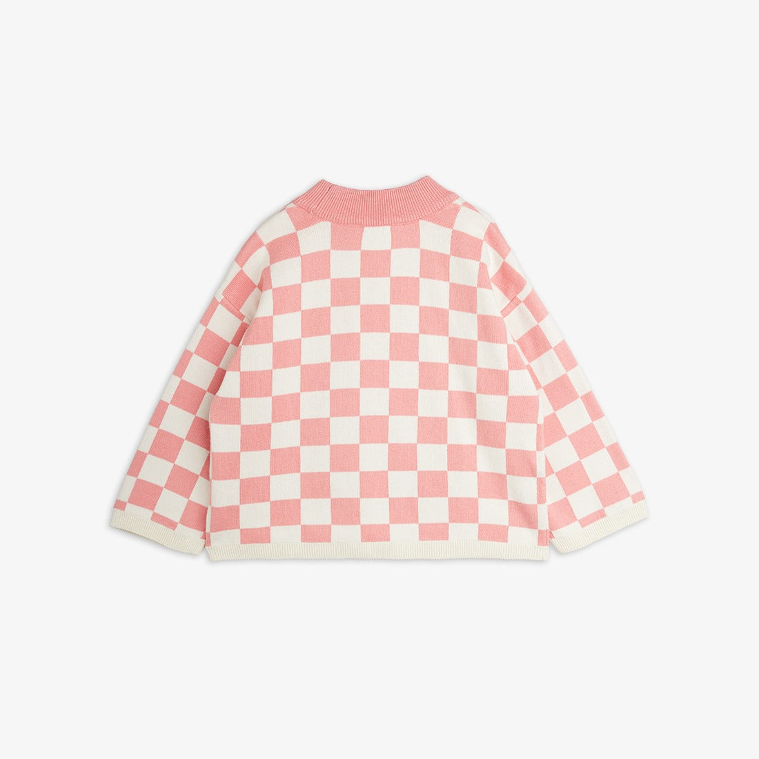 Parte trasera del jersey de niña rosa cuadros ajedrez.