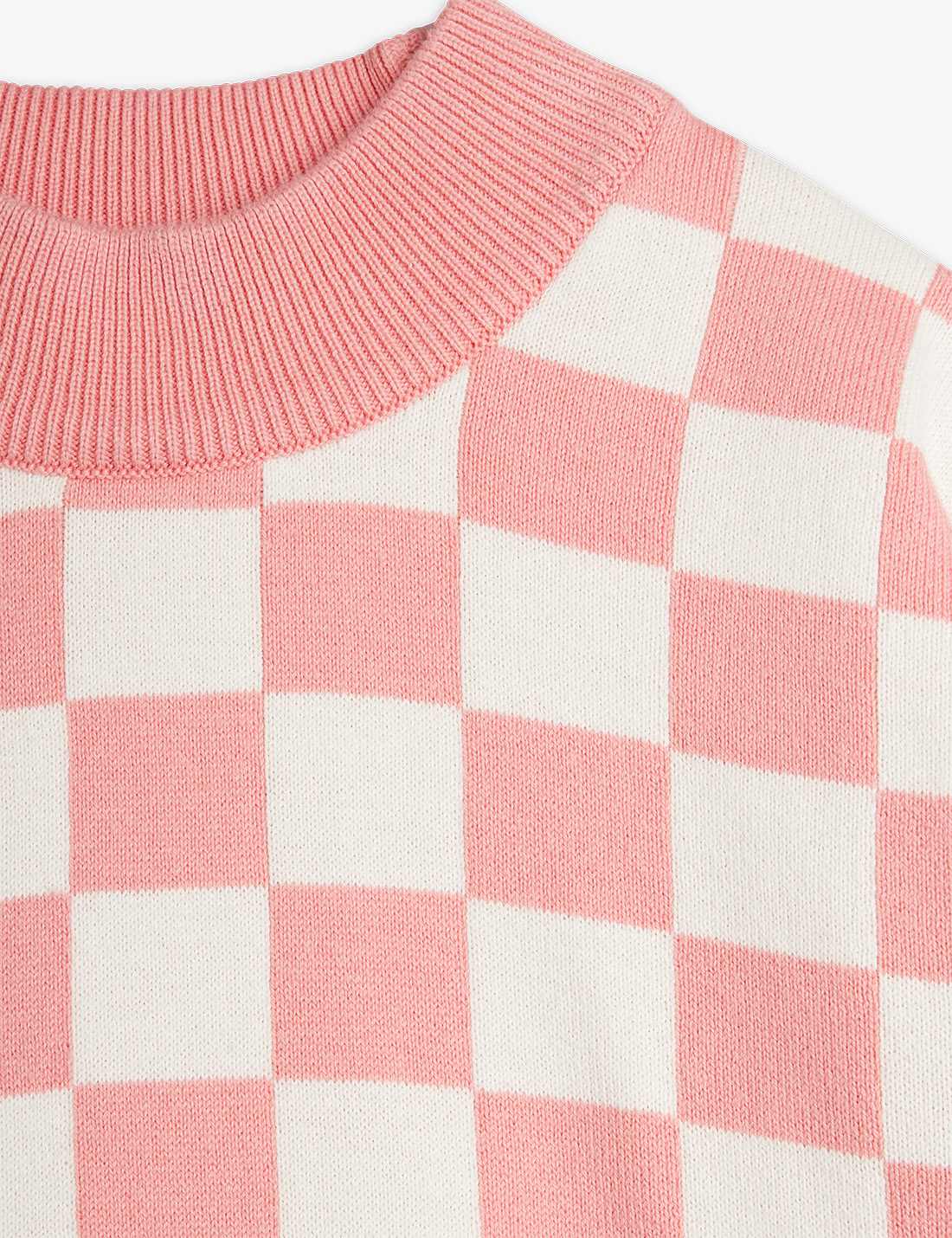 Detalle del diseño cuadros ajedrez en color rosa.