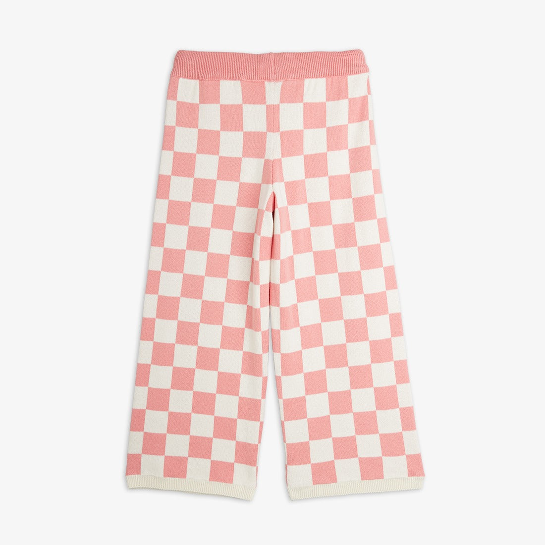 Parte trasera del pantalón de niña rosa cuadros ajedrez.
