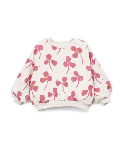 Sudadera Niña Algodón Orgánico Cruda Floral Rosa de Play Up - vista frontal.