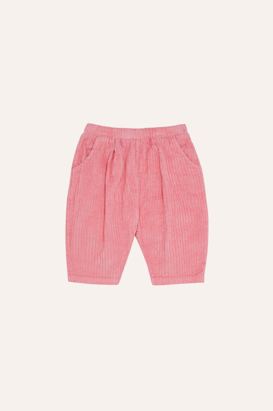 Pantalón de bebé rosa de pana con cintura elástica, vista frontal.