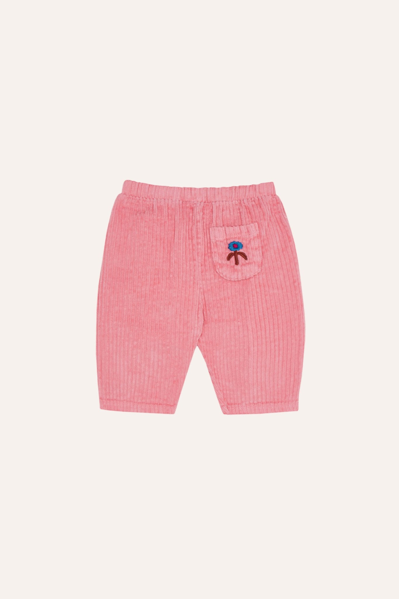 Pantalón de bebé rosa de pana con bordado trasero.