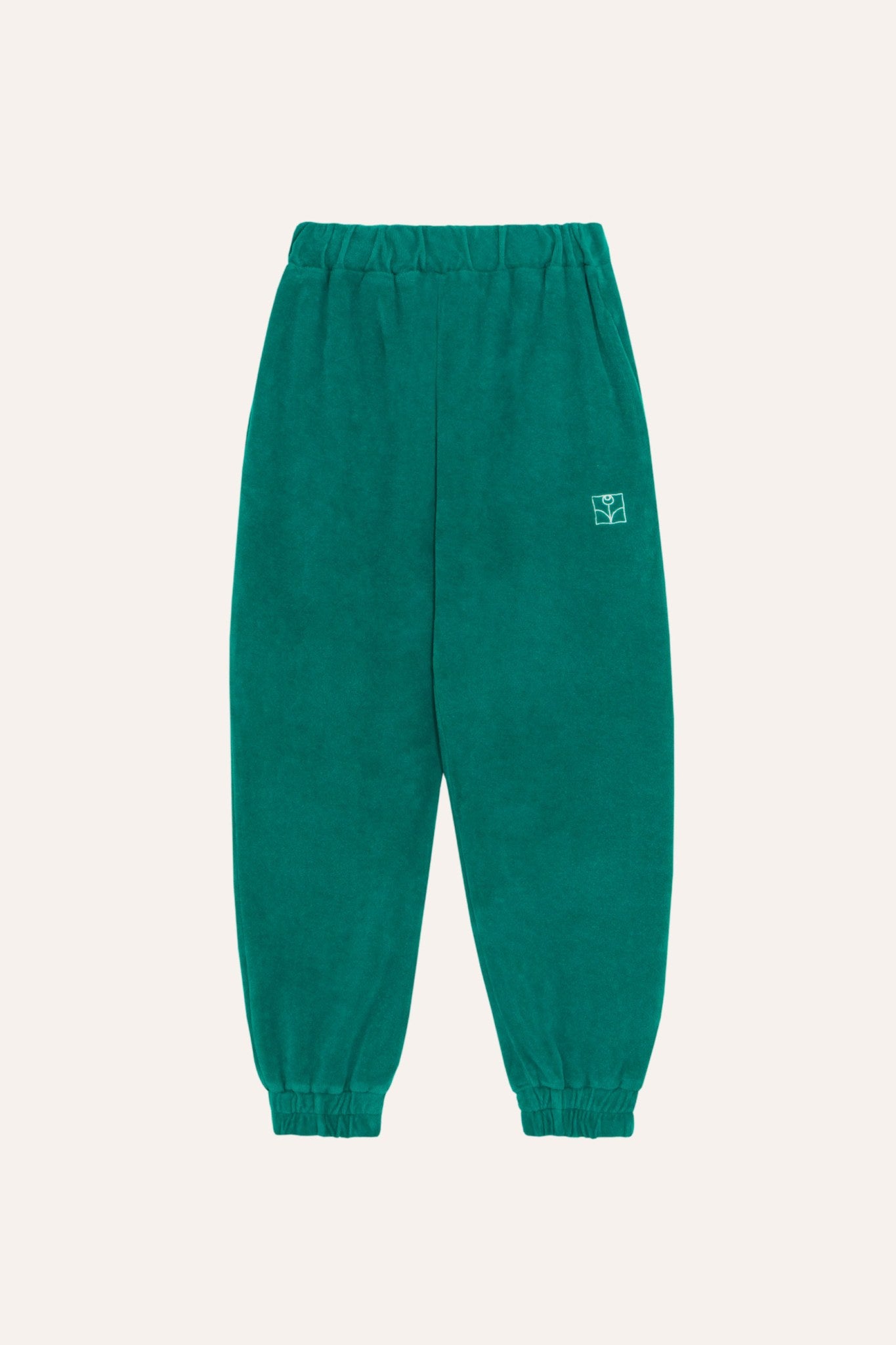 Pantalón infantil verde de terciopelo, vista frontal.