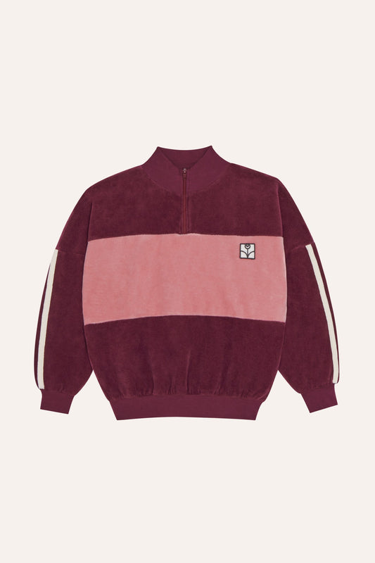 Sudadera de terciopelo burdeos y rosa con cuello alto, vista frontal.