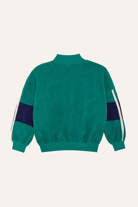 Sudadera verde de terciopelo con bandas laterales, vista trasera.