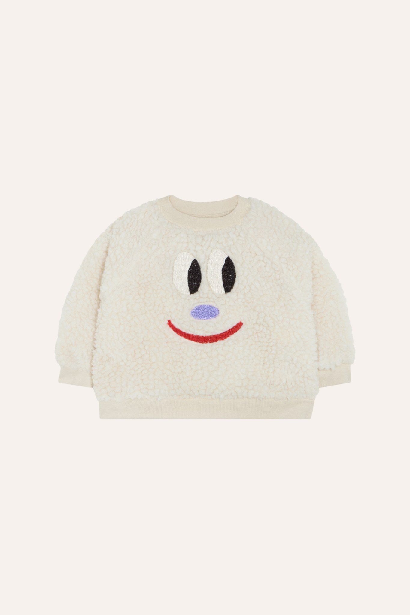 Sudadera de bebé cruda de borreguito con cara sonriente, vista frontal.