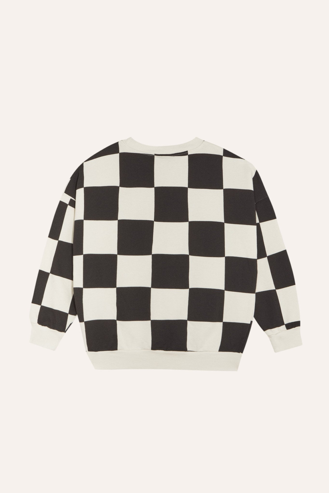 Sudadera de cuadros negros y crudos, vista trasera.